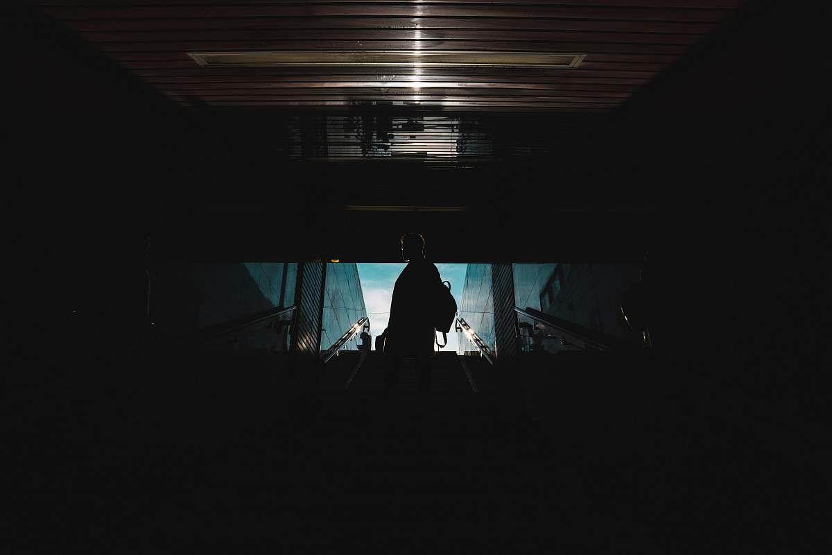 interior design silhouette of person standing inside building indoors